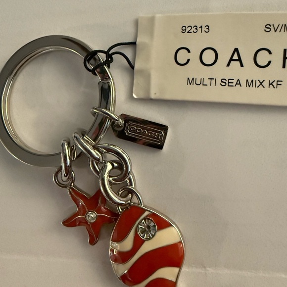 Vintage Coach Silver and Orange fish and star Keychain nwt - Picture 4 of 4